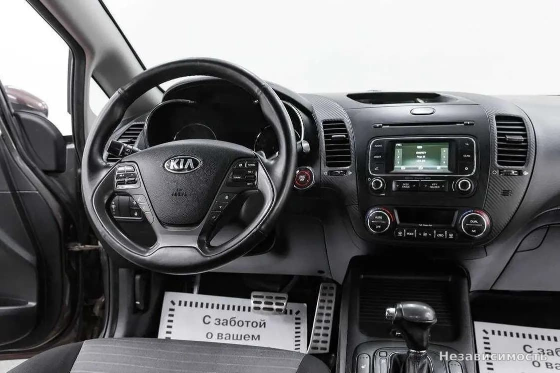 KIA Cerato 2013 с пробегом — фото 9