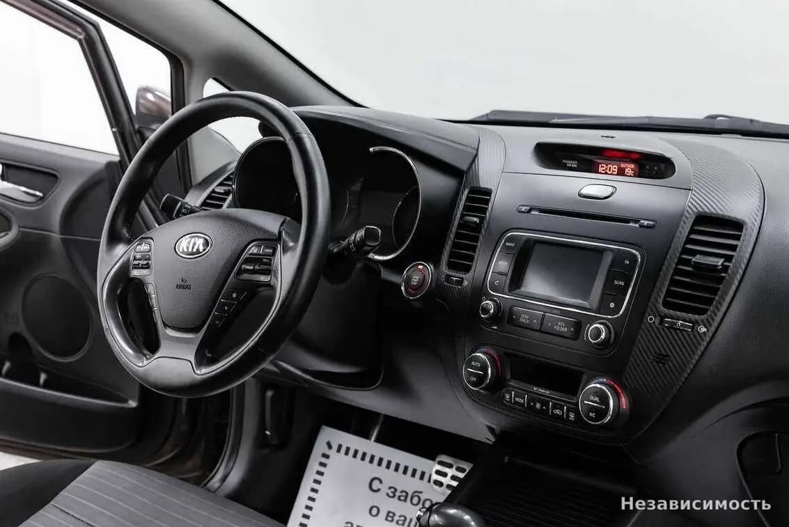 KIA Cerato 2013 с пробегом — фото 10