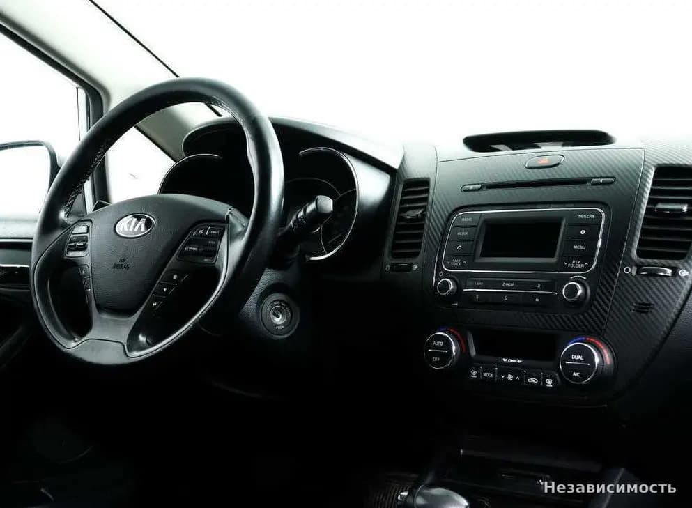 KIA Cerato 2014 с пробегом — фото 9