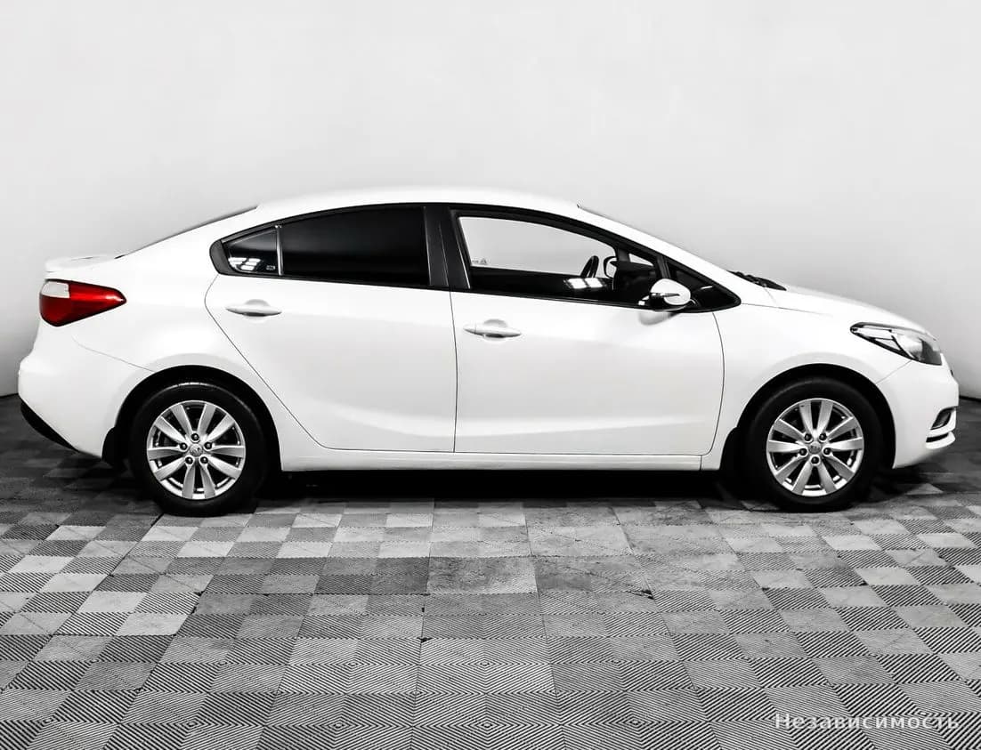 KIA Cerato 2013 с пробегом — фото 4
