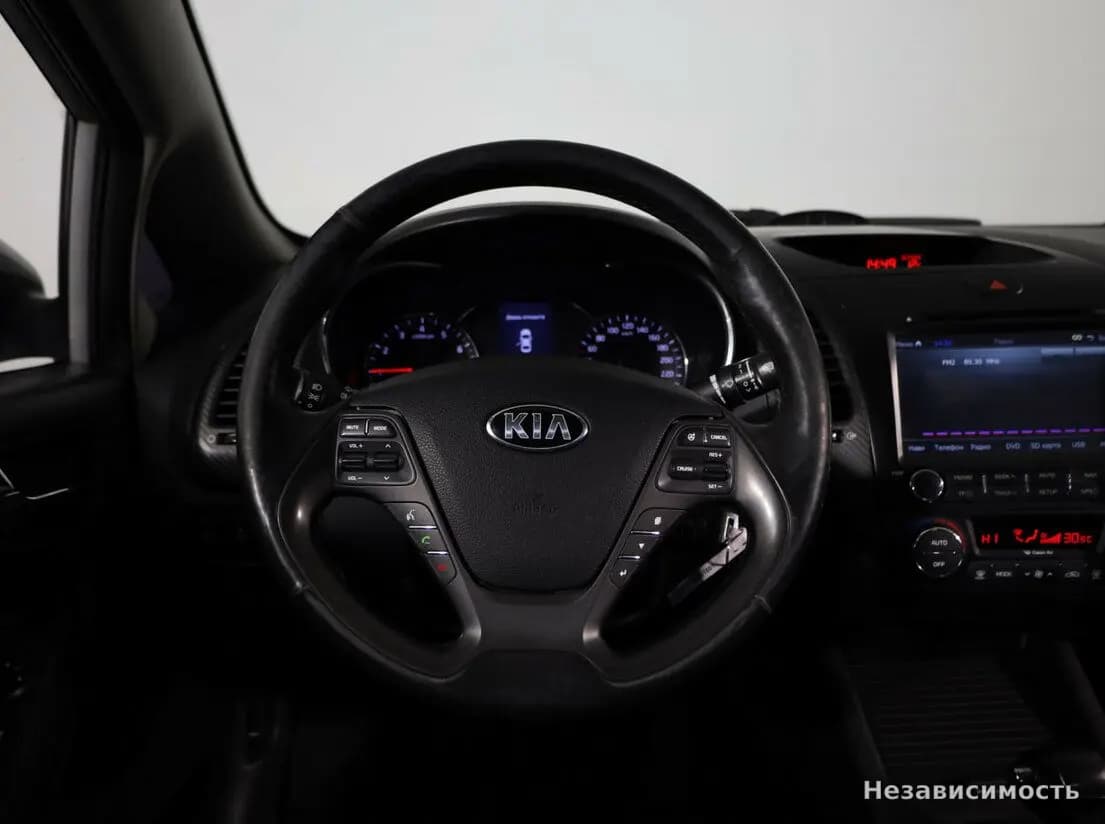 KIA Cerato 2013 с пробегом — фото 10