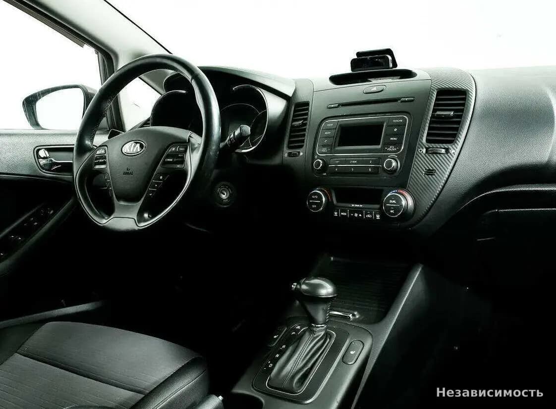 KIA Cerato 2014 с пробегом — фото 9