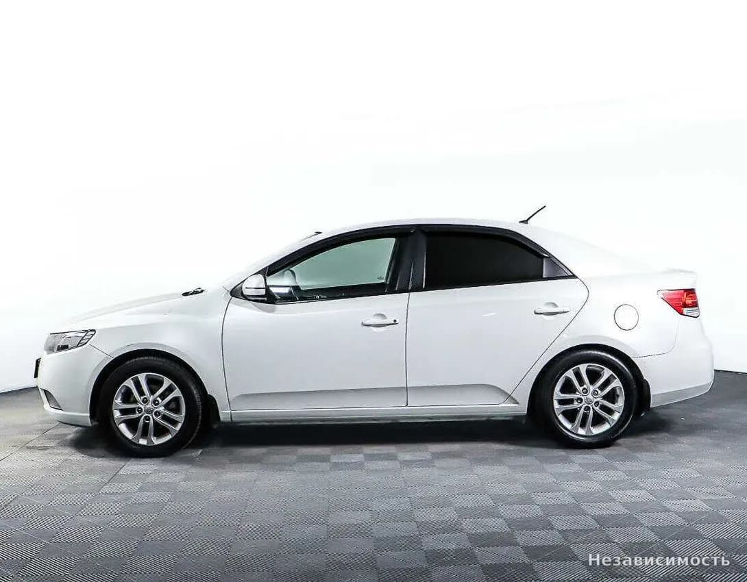 KIA Cerato 2012 с пробегом — фото 8