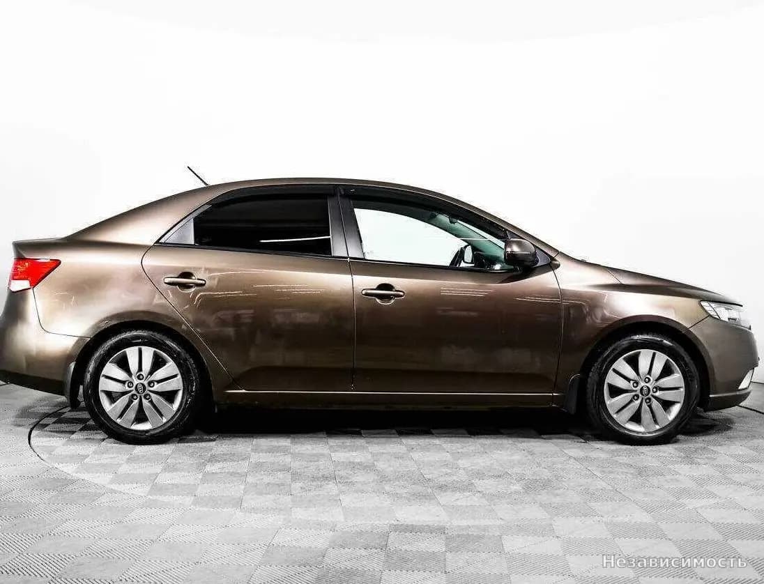 KIA Cerato 2012 с пробегом — фото 4