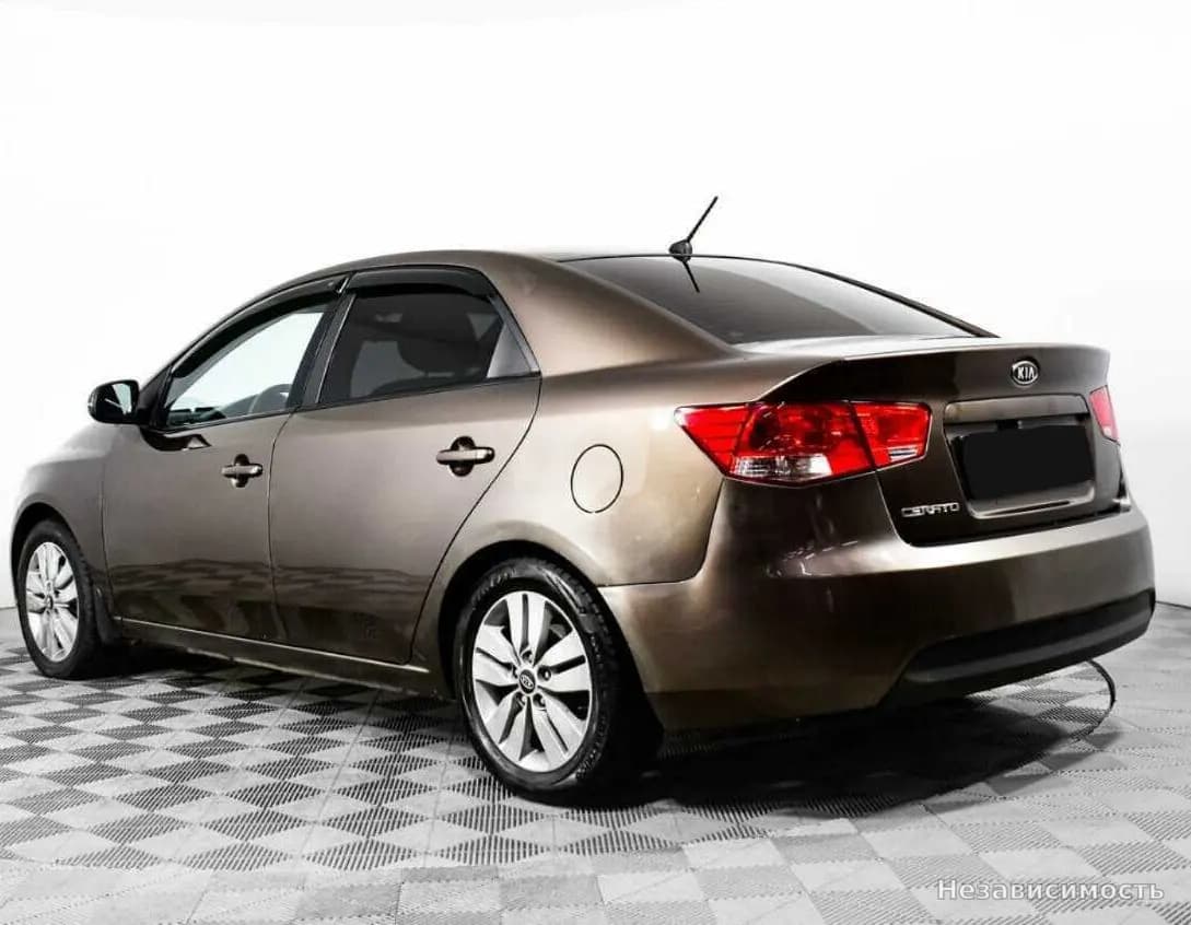 KIA Cerato 2012 с пробегом — фото 7
