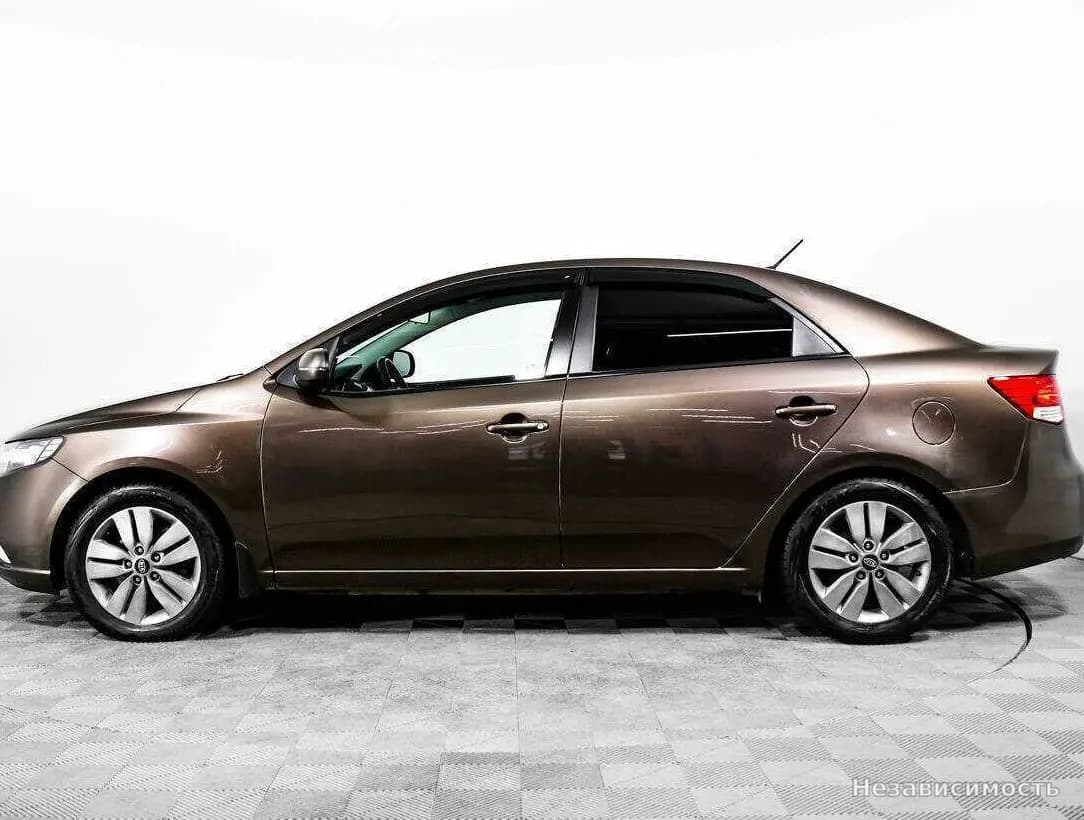 KIA Cerato 2012 с пробегом — фото 8