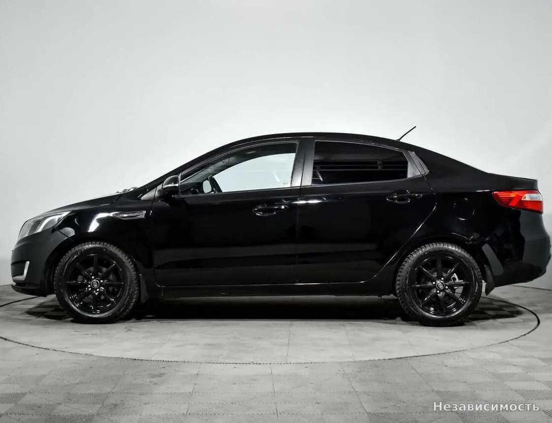 KIA Rio 2013 с пробегом — фото 8