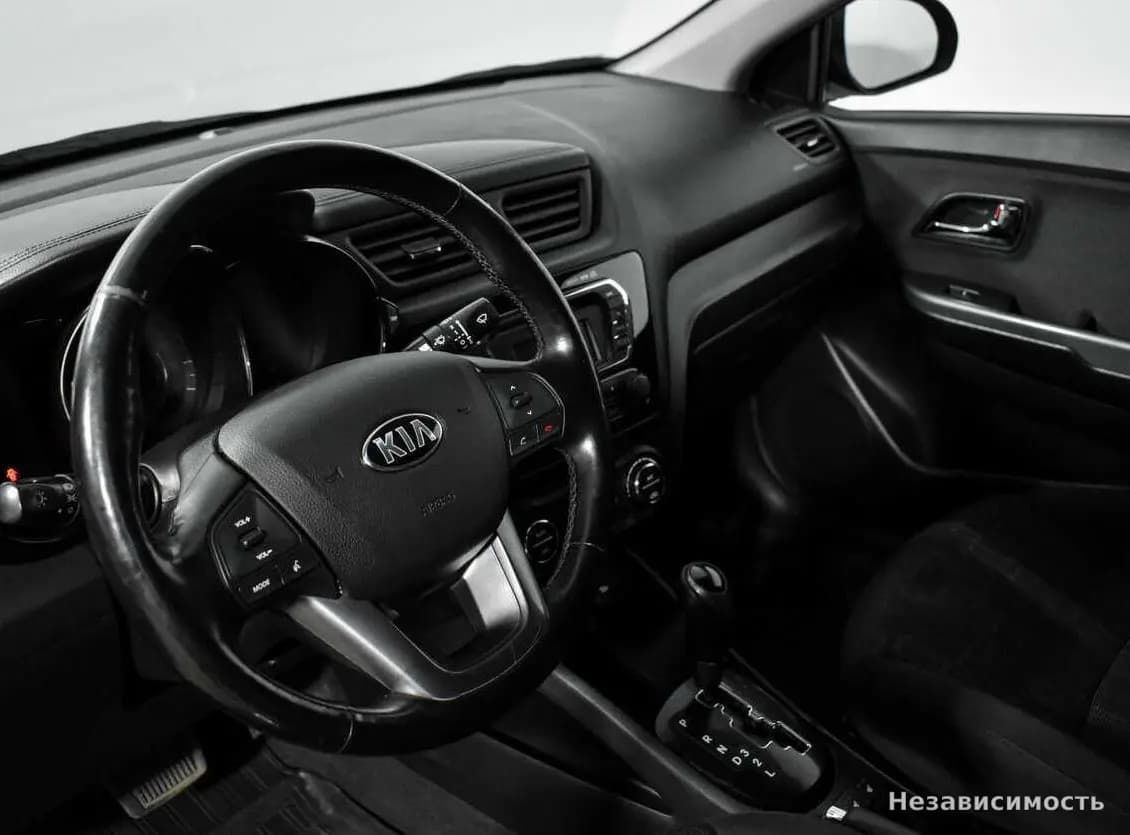 KIA Rio 2013 с пробегом — фото 9