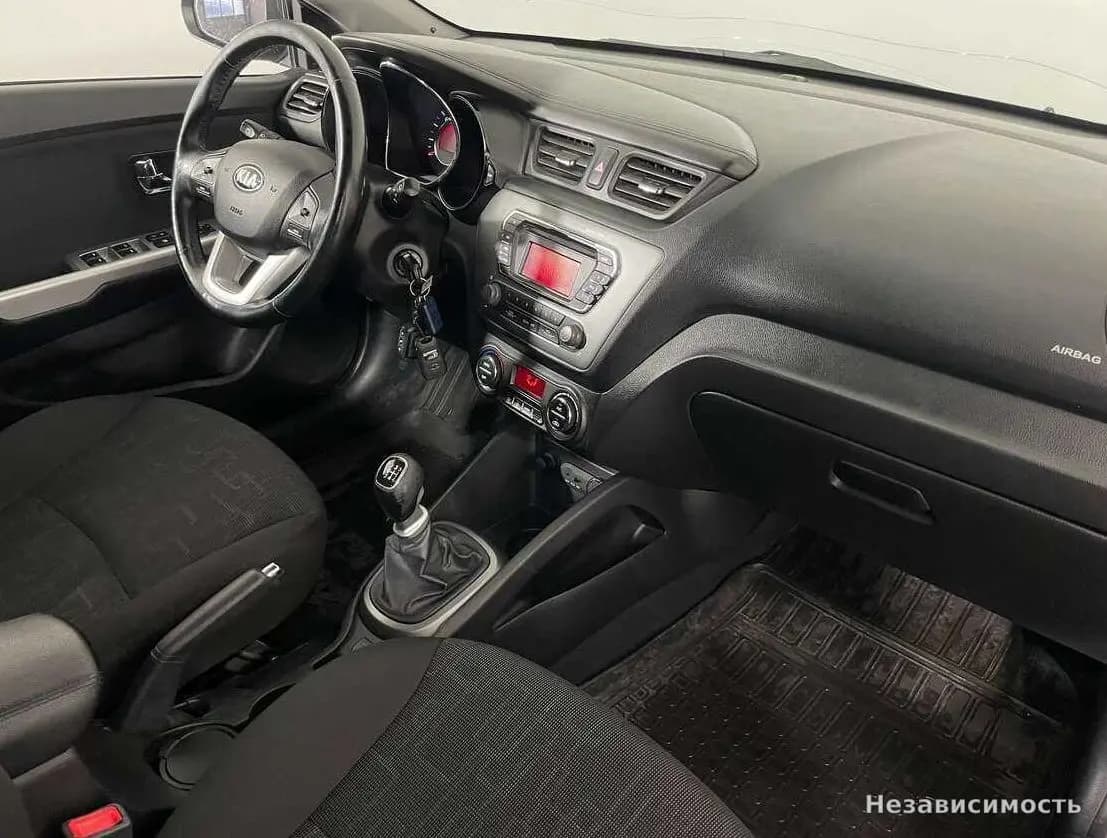 KIA Rio 2014 с пробегом — фото 8