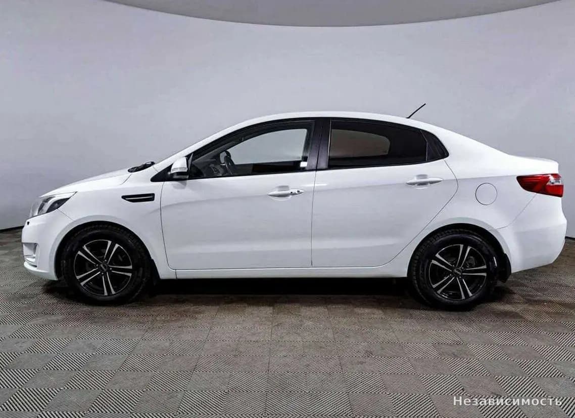 KIA Rio 2014 с пробегом — фото 7