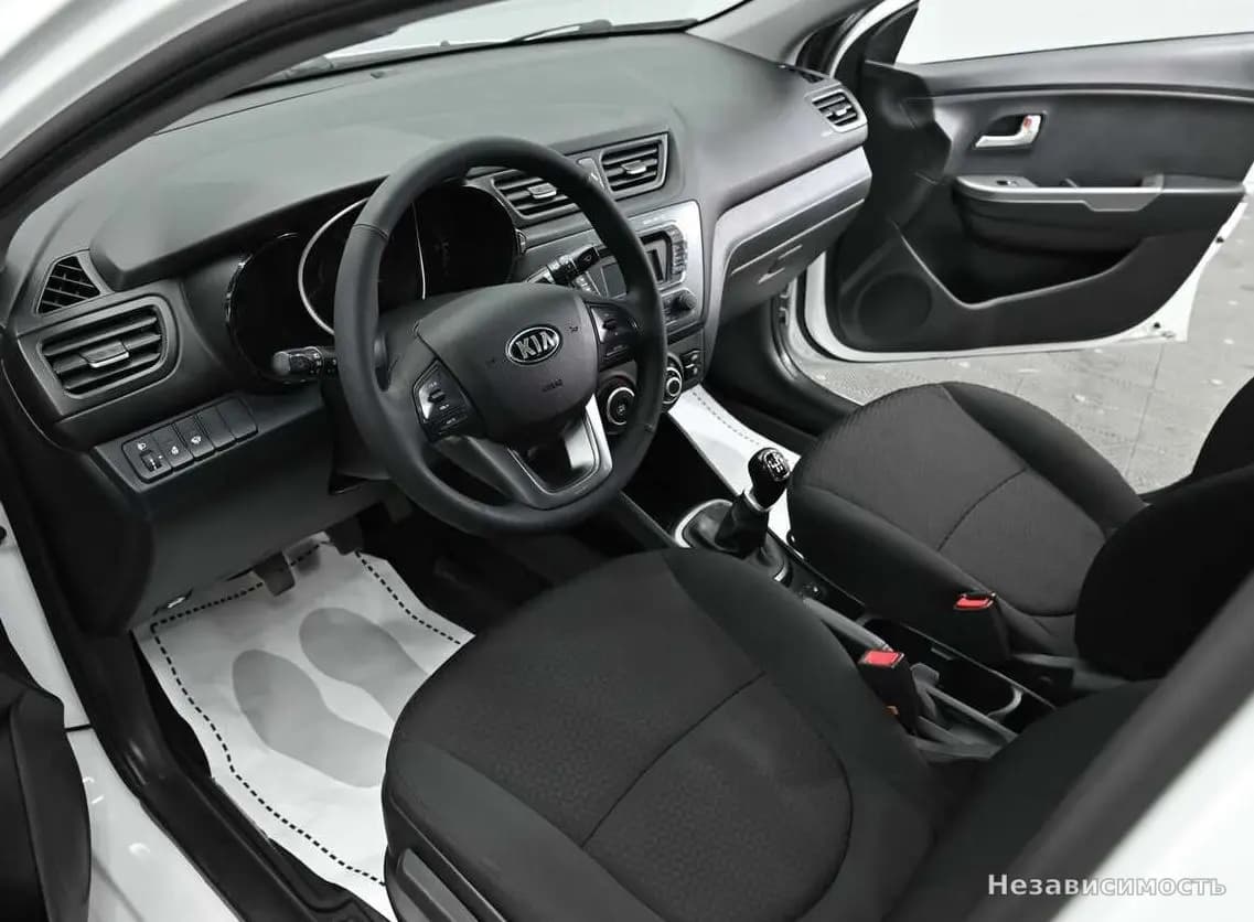 KIA Rio 2013 с пробегом — фото 8