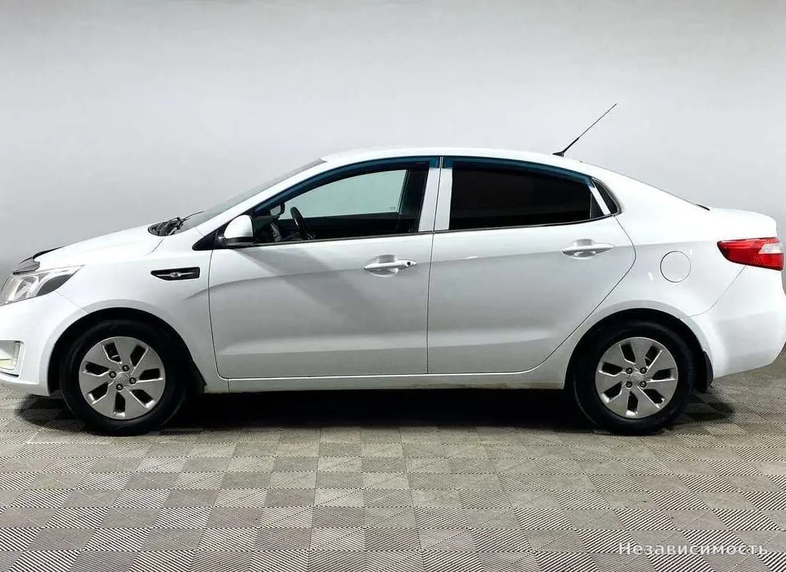 KIA Rio 2014 с пробегом — фото 8