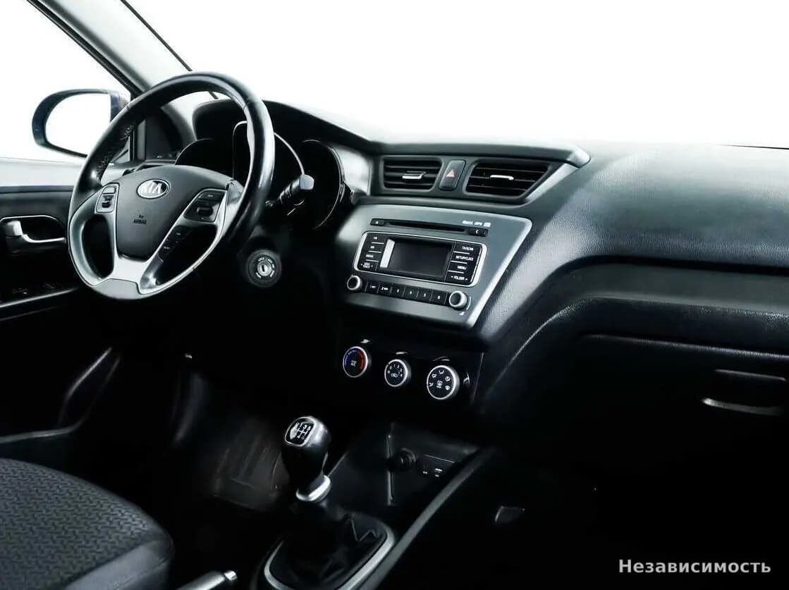 KIA Rio 2015 с пробегом — фото 7