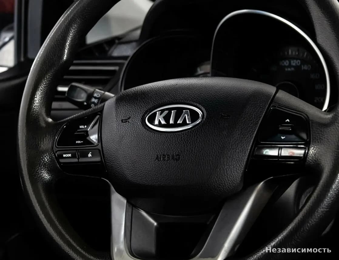 KIA Rio 2012 с пробегом — фото 9