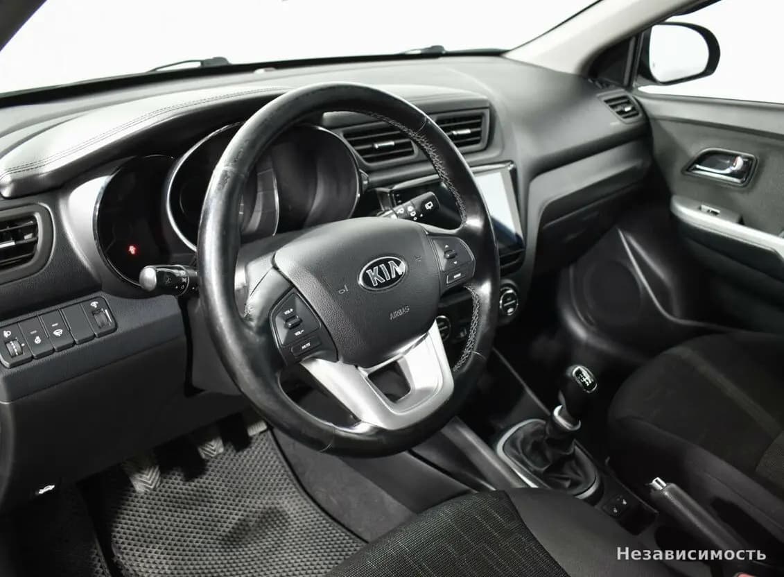 KIA Rio 2014 с пробегом — фото 9
