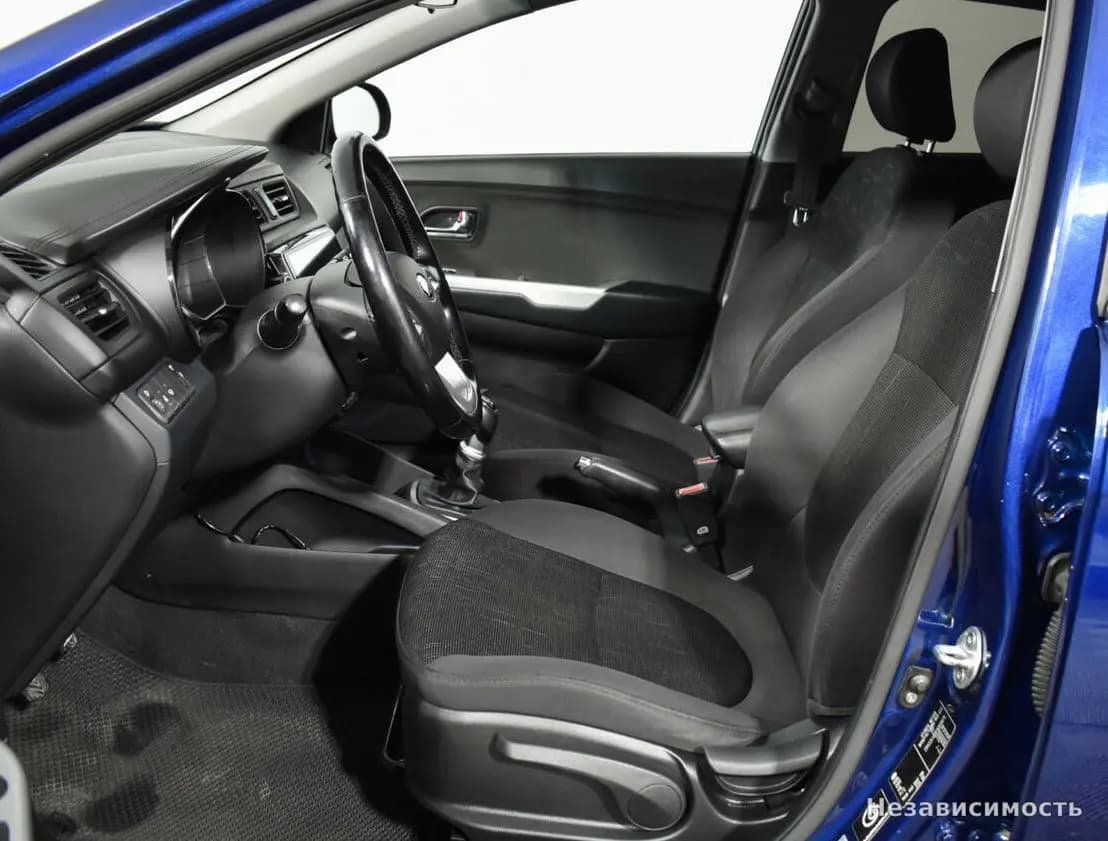 KIA Rio 2014 с пробегом — фото 10