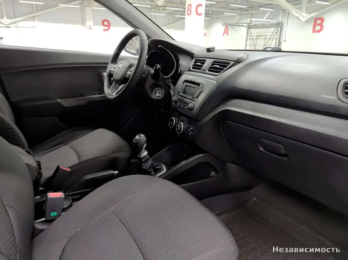 KIA Rio 2014 с пробегом — фото 10