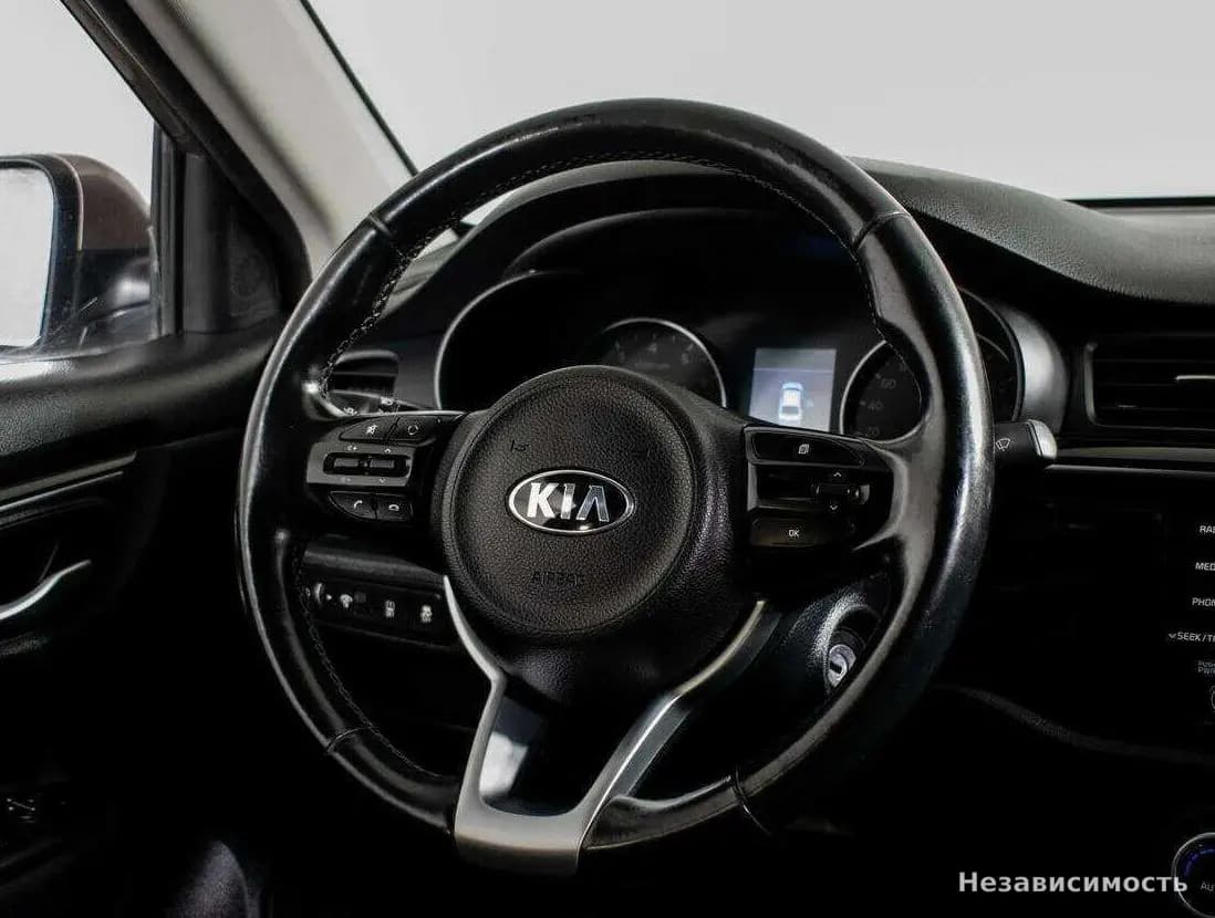 KIA Rio 2017 с пробегом — фото 10