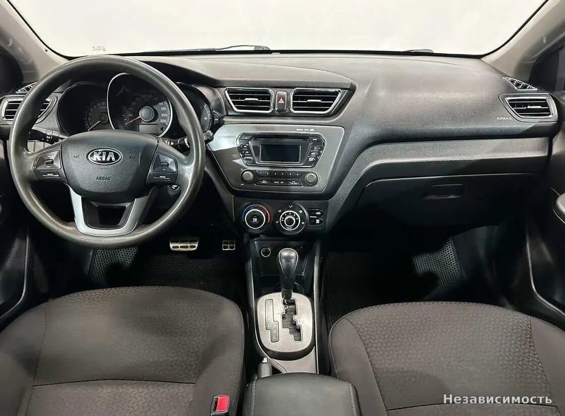 KIA Rio 2013 с пробегом — фото 10