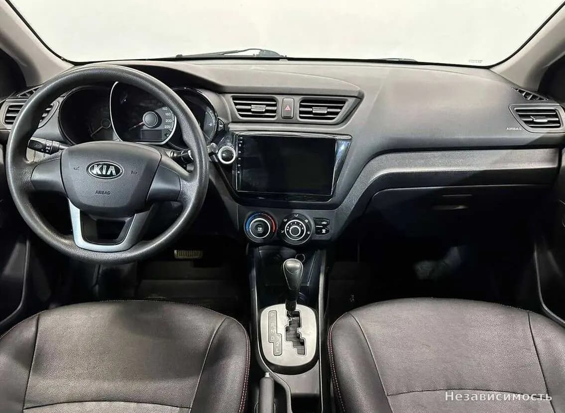 KIA Rio 2013 с пробегом — фото 10