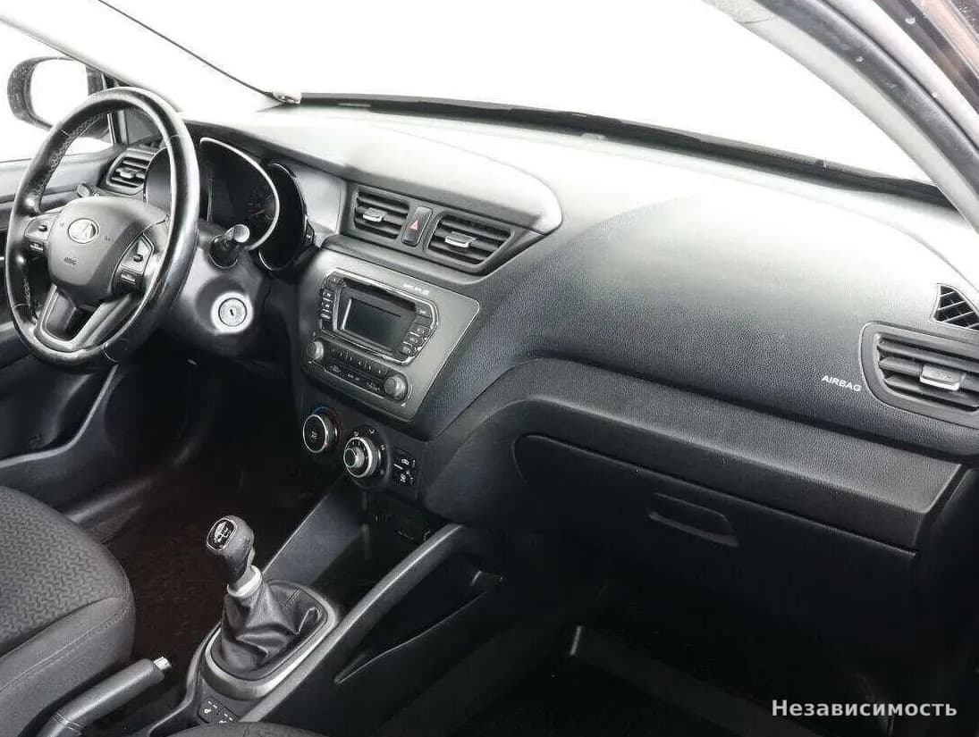 KIA Rio 2014 с пробегом — фото 10