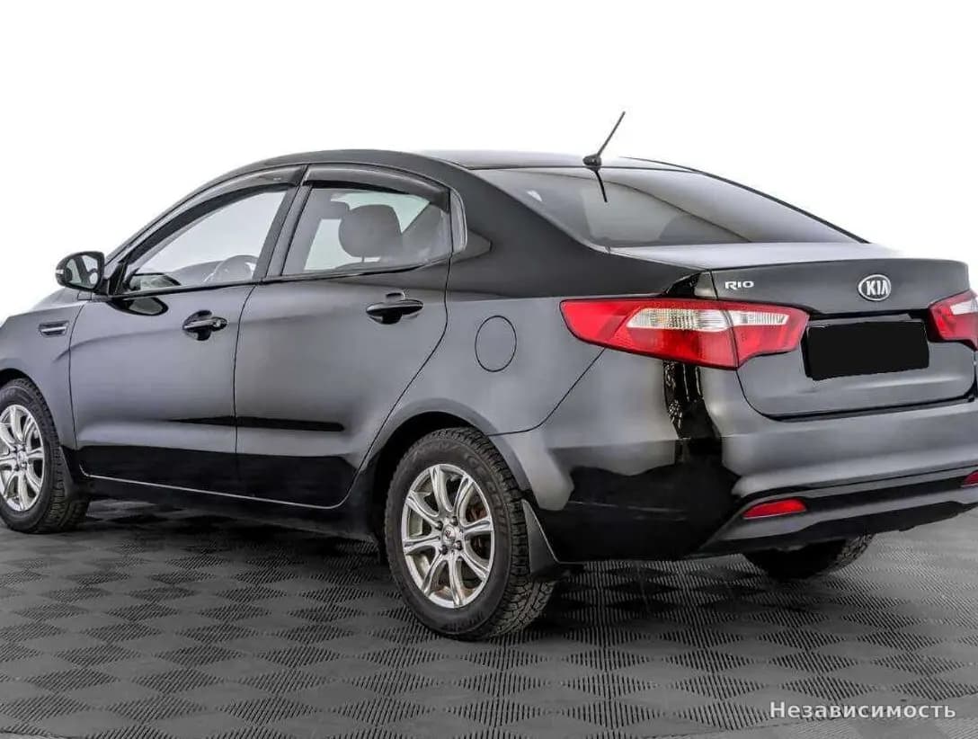 KIA Rio 2014 с пробегом — фото 7