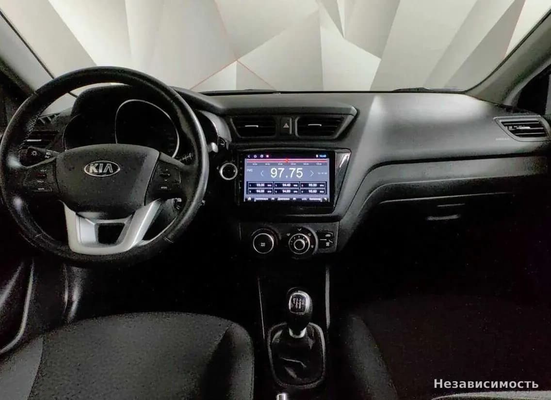 KIA Rio 2014 с пробегом — фото 10