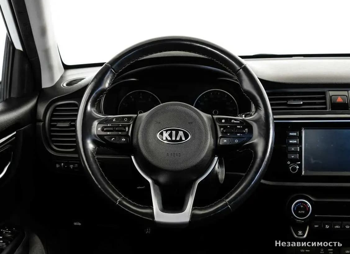 KIA Rio 2018 с пробегом — фото 10