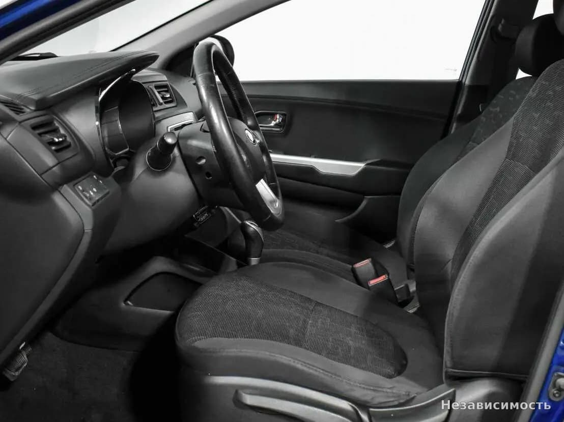 KIA Rio 2013 с пробегом — фото 10