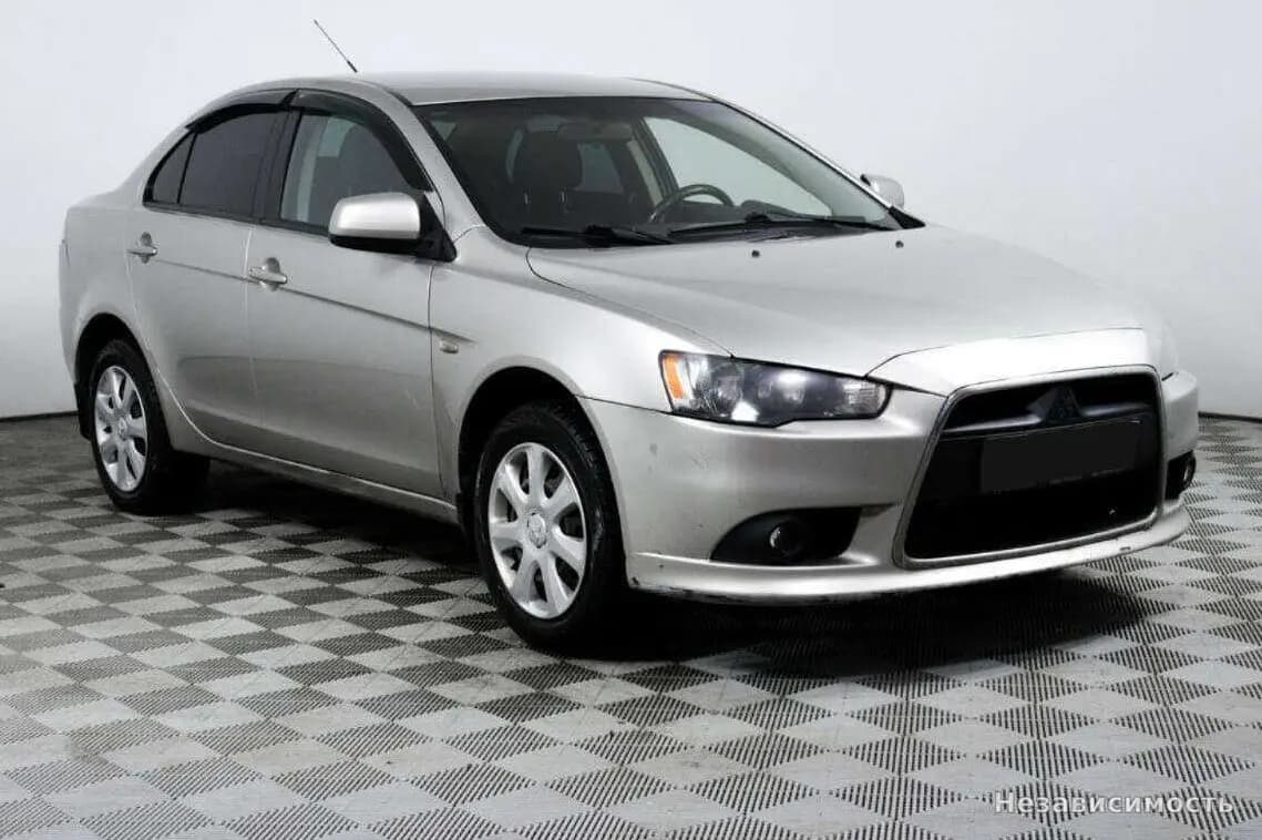Mitsubishi Lancer 2012 с пробегом — фото 3