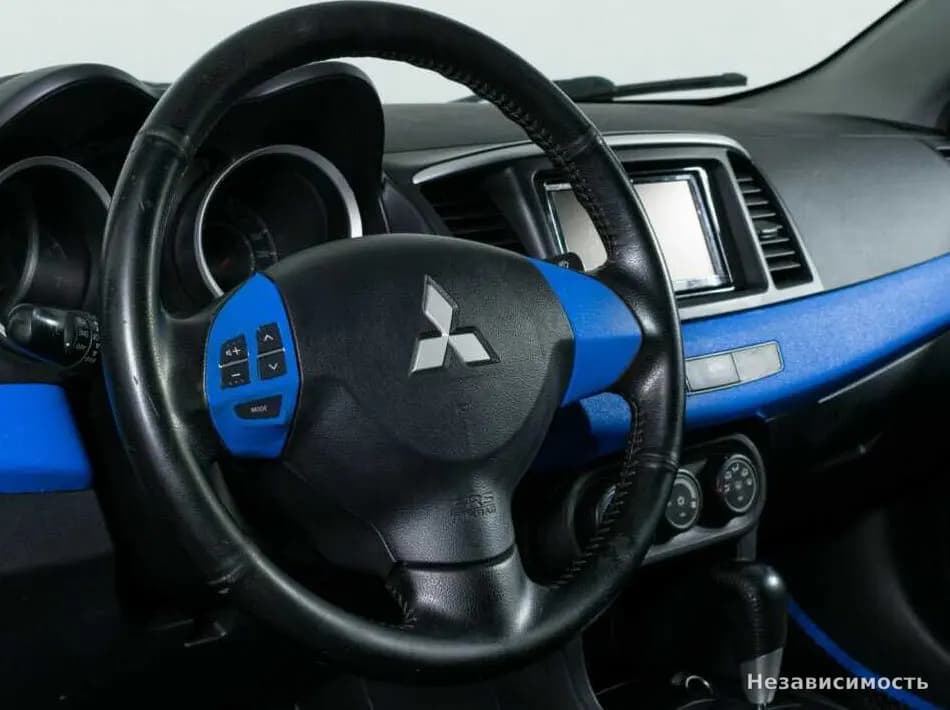 Mitsubishi Lancer 2014 с пробегом — фото 10
