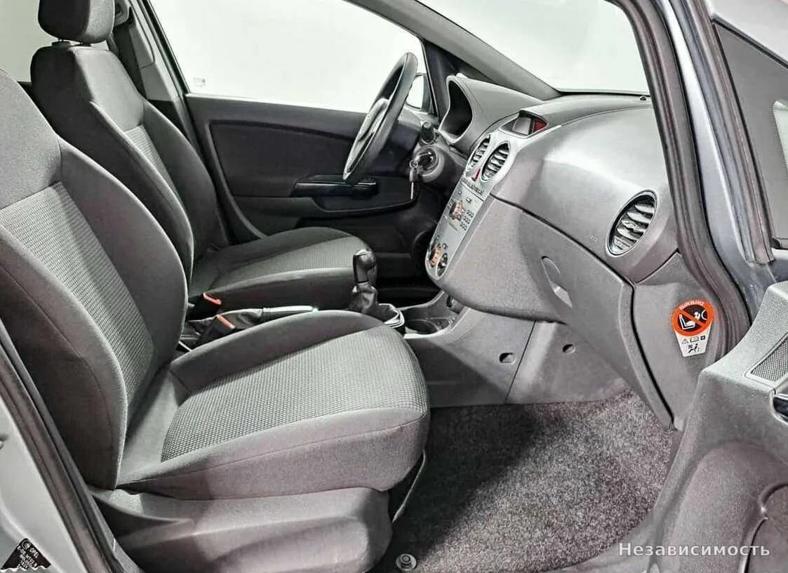 Opel Corsa 2012 с пробегом — фото 9
