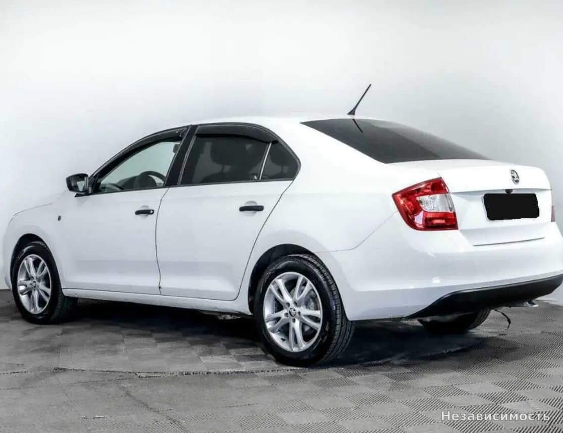 Skoda Rapid 2014 с пробегом — фото 6