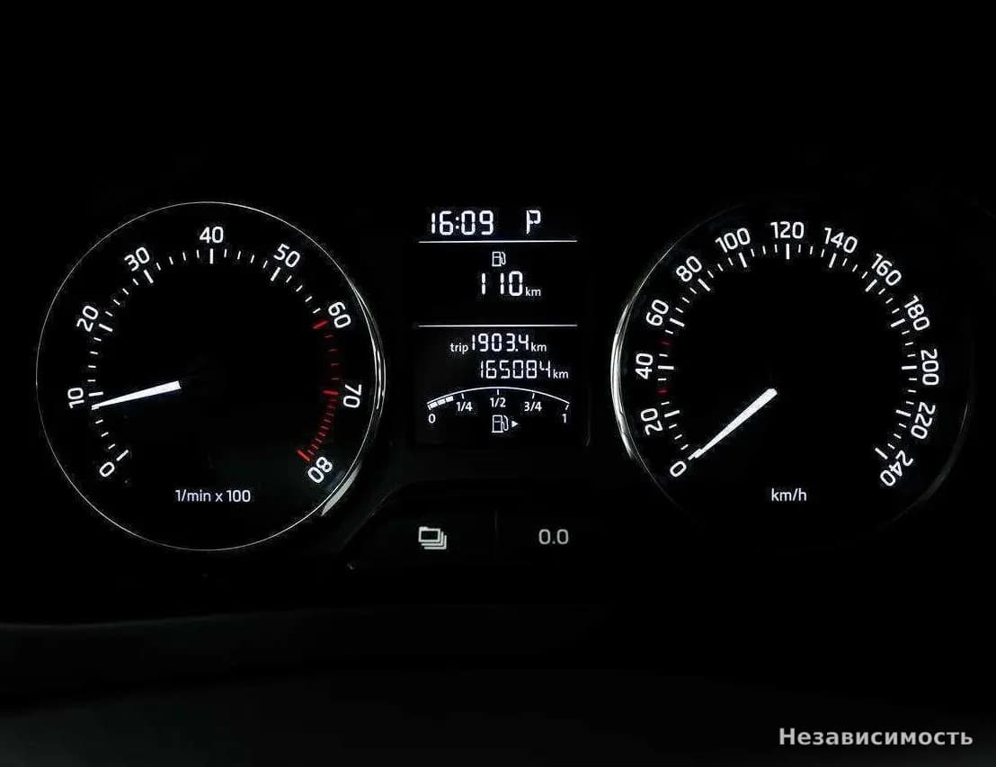 Skoda Rapid 2014 с пробегом — фото 10