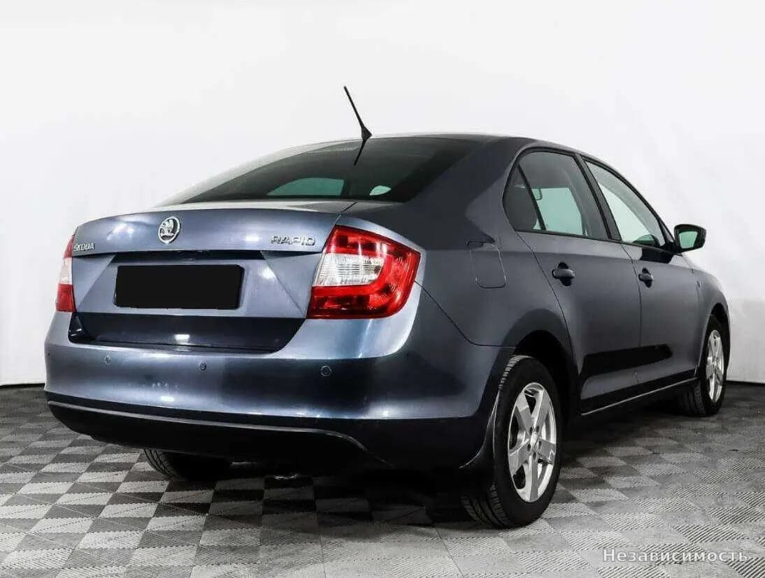 Skoda Rapid 2014 с пробегом — фото 4