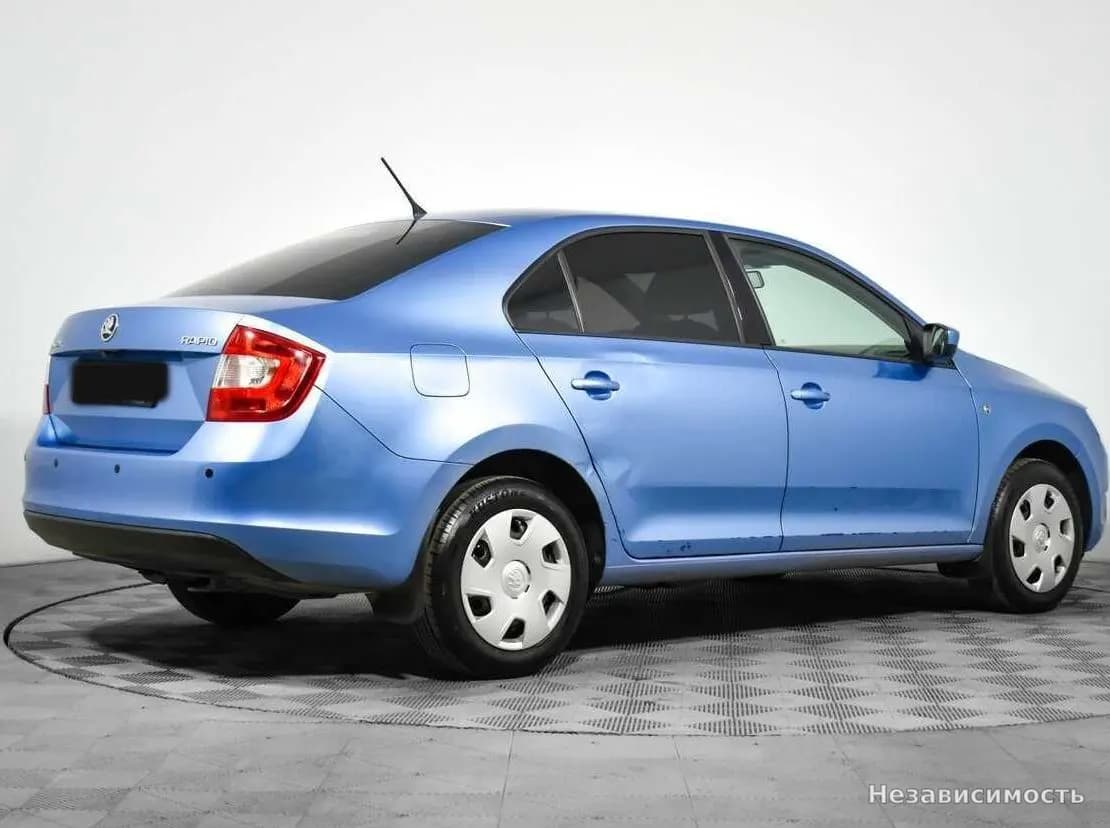 Skoda Rapid 2014 с пробегом — фото 5