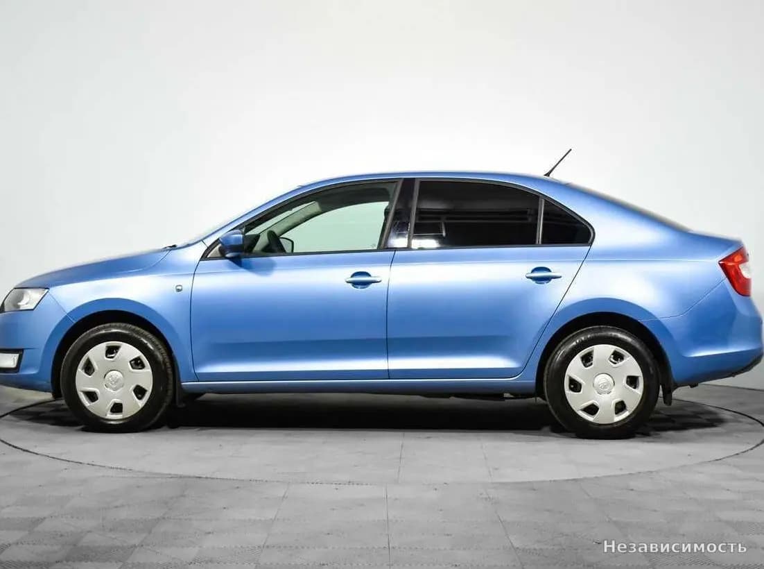 Skoda Rapid 2014 с пробегом — фото 8