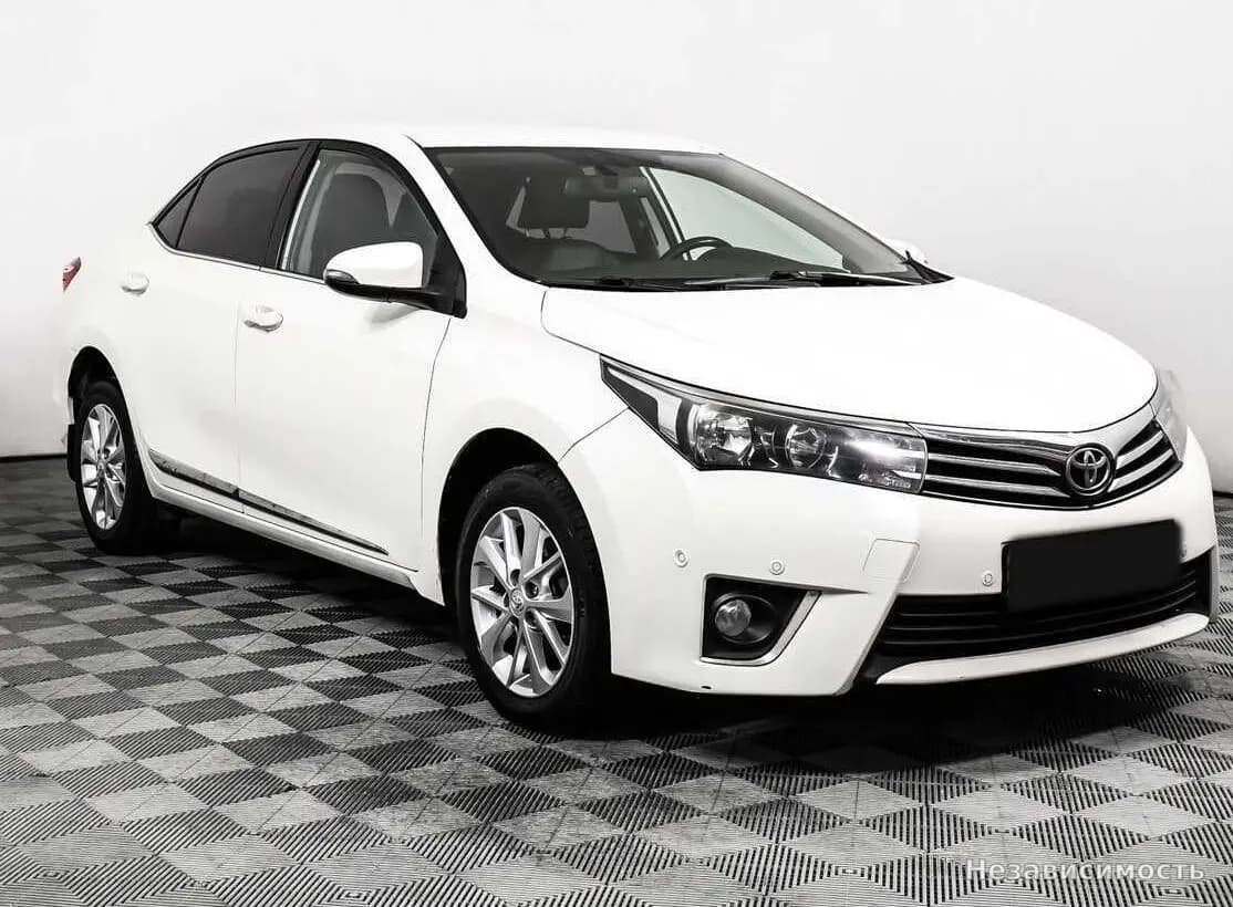 Toyota Corolla 2013 с пробегом — фото 3