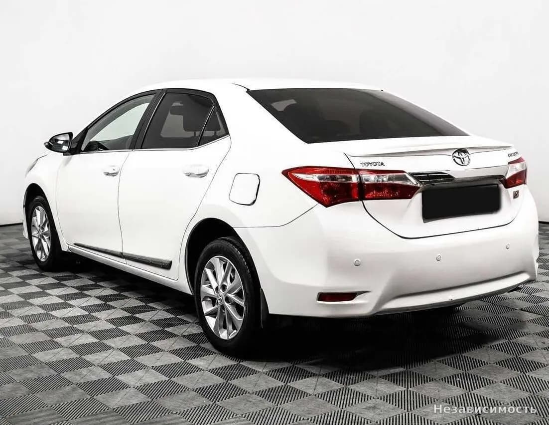 Toyota Corolla 2013 с пробегом — фото 7