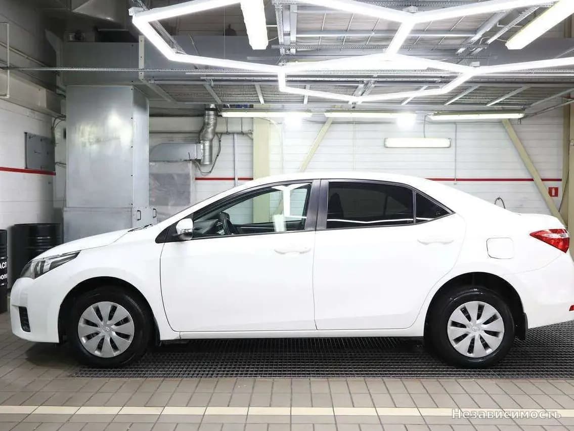 Toyota Corolla 2014 с пробегом — фото 5