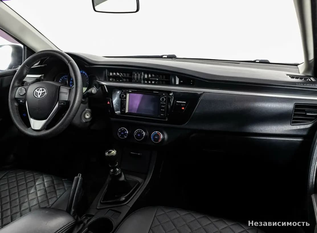 Toyota Corolla 2014 с пробегом — фото 7