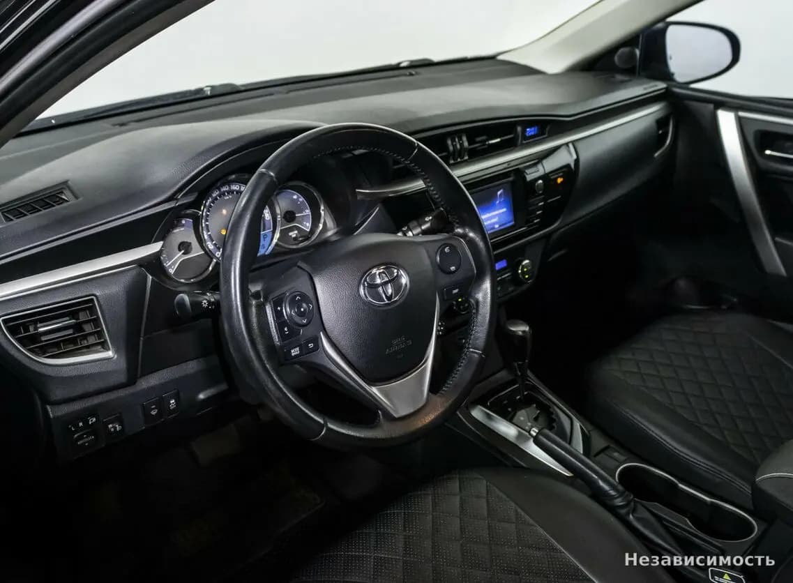 Toyota Corolla 2013 с пробегом — фото 9