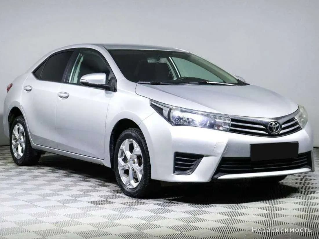 Toyota Corolla 2013 с пробегом — фото 2