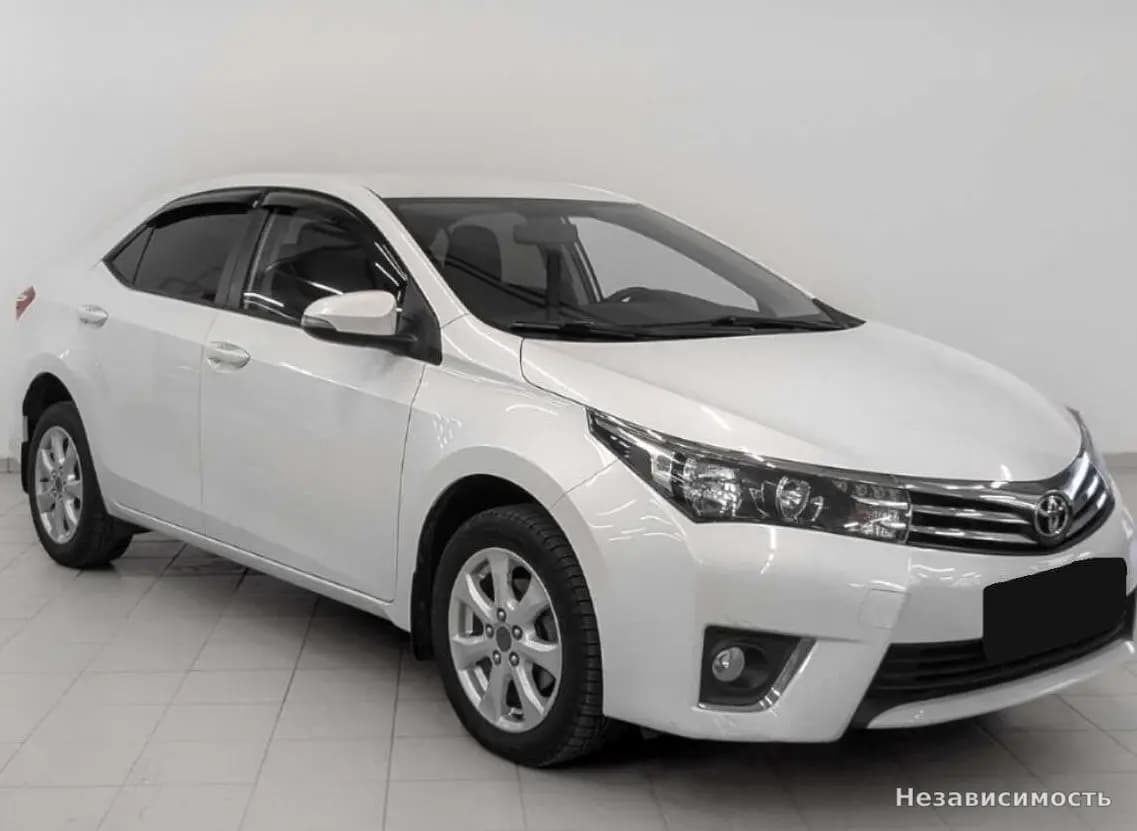 Toyota Corolla 2014 с пробегом — фото 3