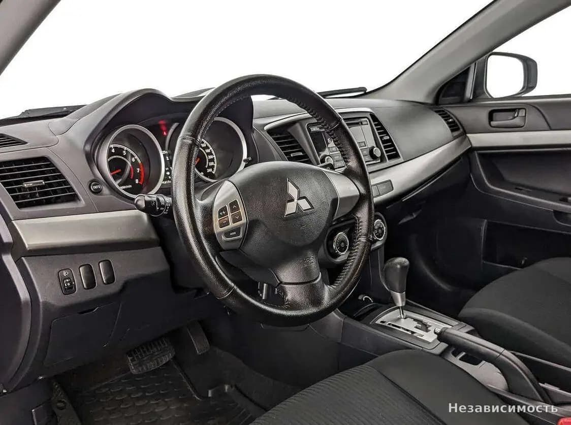 Mitsubishi Lancer 2015 с пробегом — фото 10